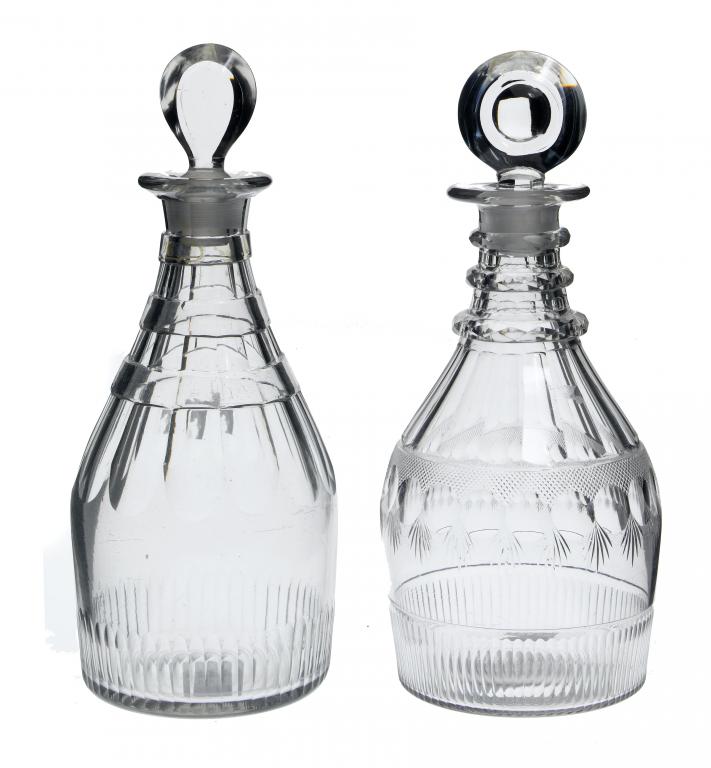 Appraisal: TWO DECANTERS AND STOPPERS of mallet shape with fluting and