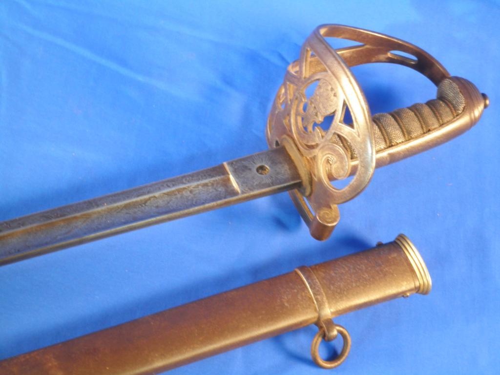 Appraisal: A Rifles Regiment dress sword with an iron scabbard a