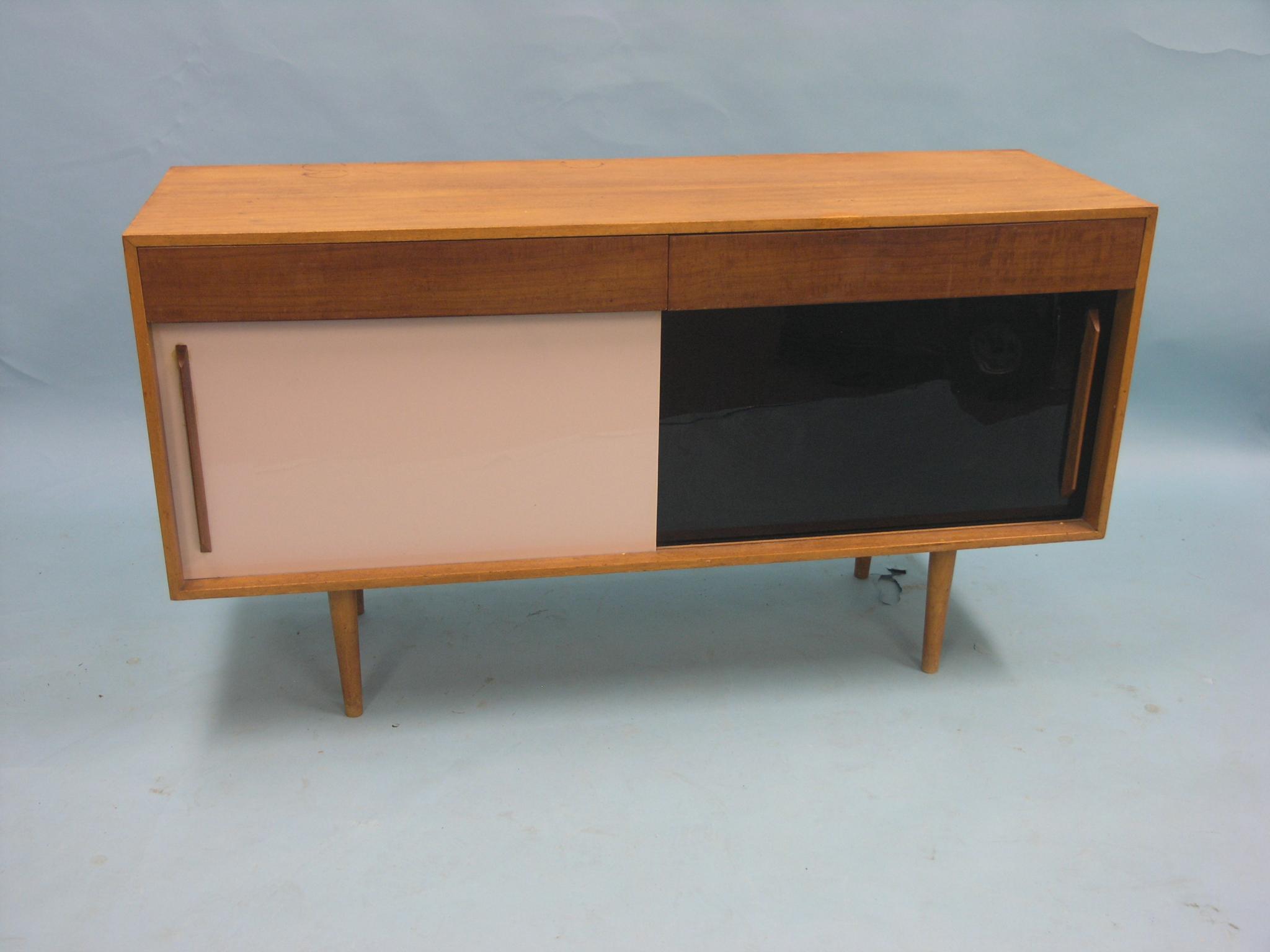 Appraisal: A mid 's teak sideboard designed by Robin Day for