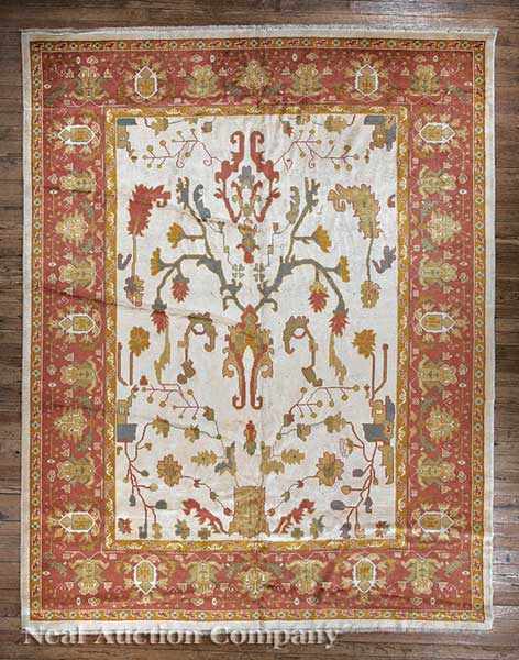 Appraisal: An Oushak Rug Turkish cream ground with floral design geometric