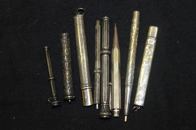 Appraisal: A COLLECTION OF EIGHT SILVER AND OTHER PROPELLING PENS and