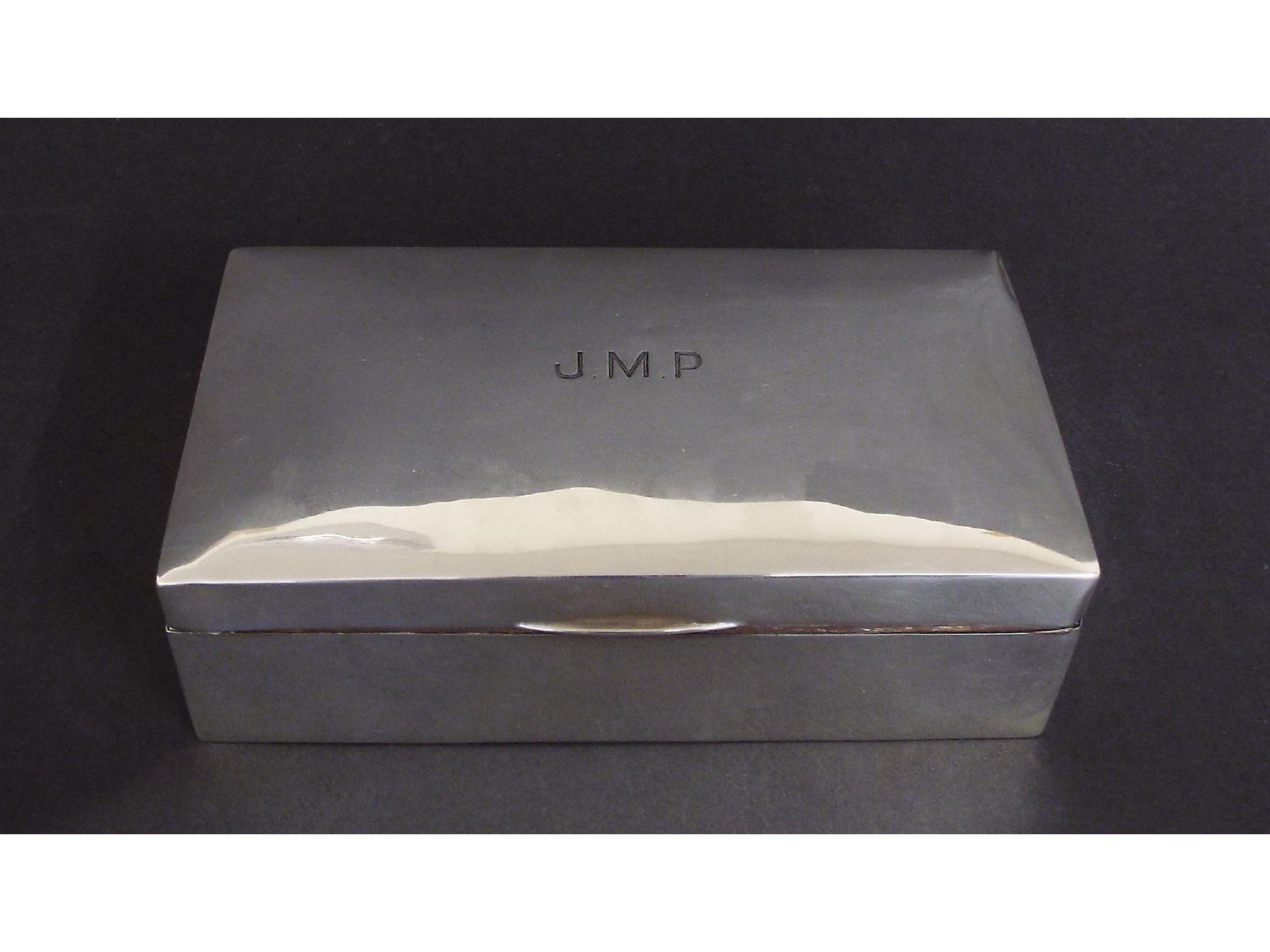 Appraisal: George V silver cigar box inscribed 'J M P' ply