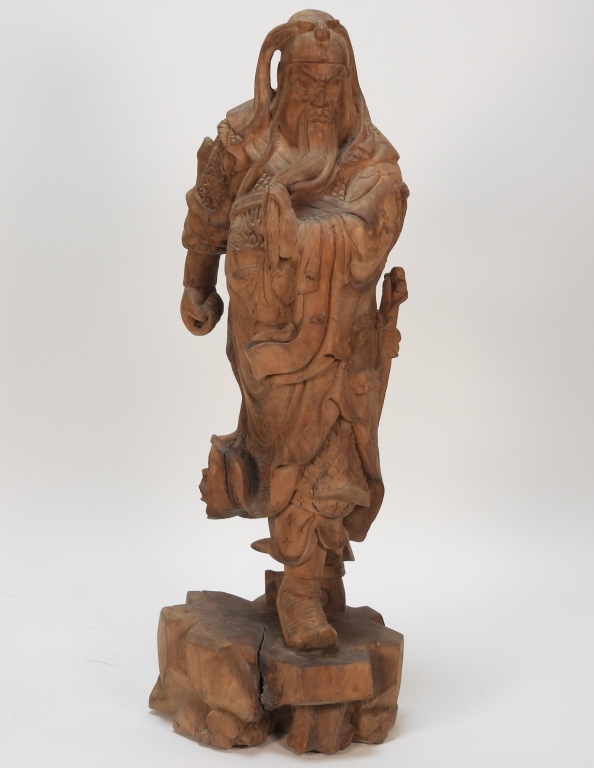 Appraisal: CHINESE CARVED WOOD SCULPTURE China Early th CenturyDepicts a bearded