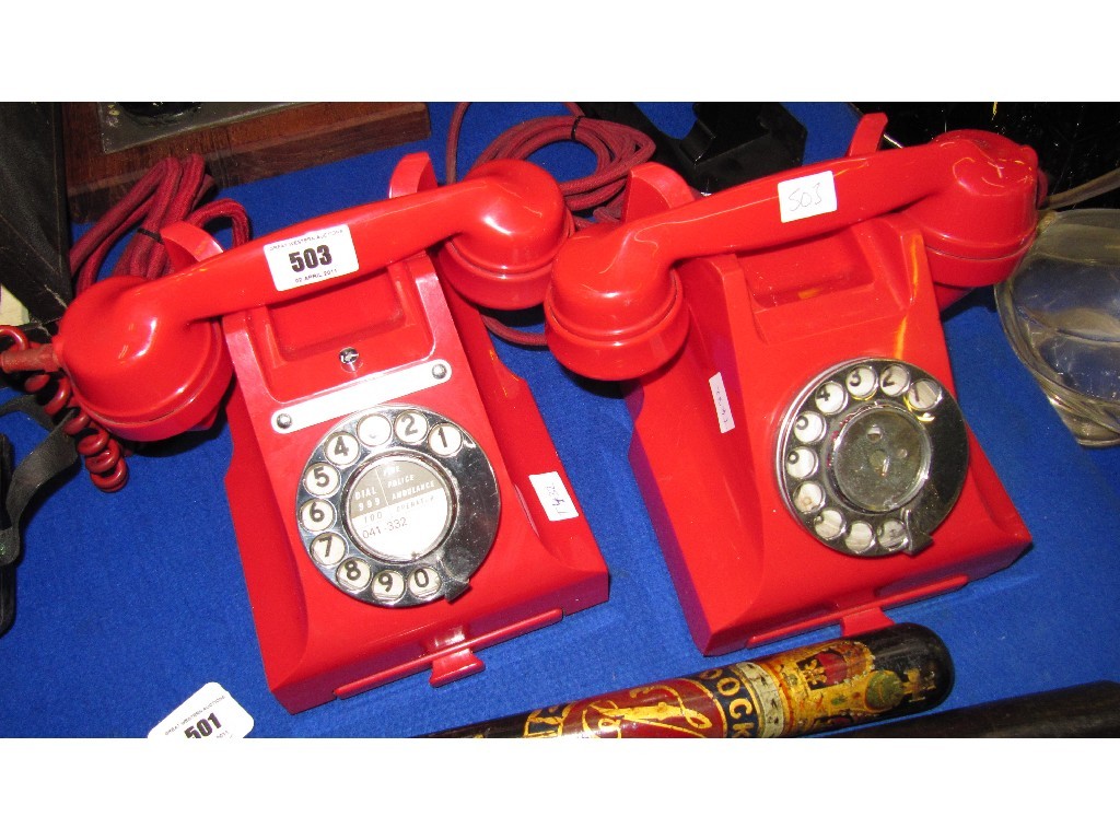 Appraisal: Lot comprising two 's red Bakelite telephones