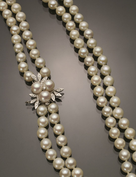 Appraisal: Matinee Length Cultured Pearl and Diamond Necklace Knotted The double