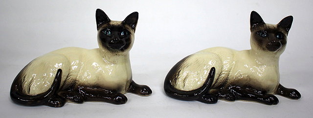 Appraisal: TWO BESWICK PORCELAIN SIAMESE CATS cm long each with original