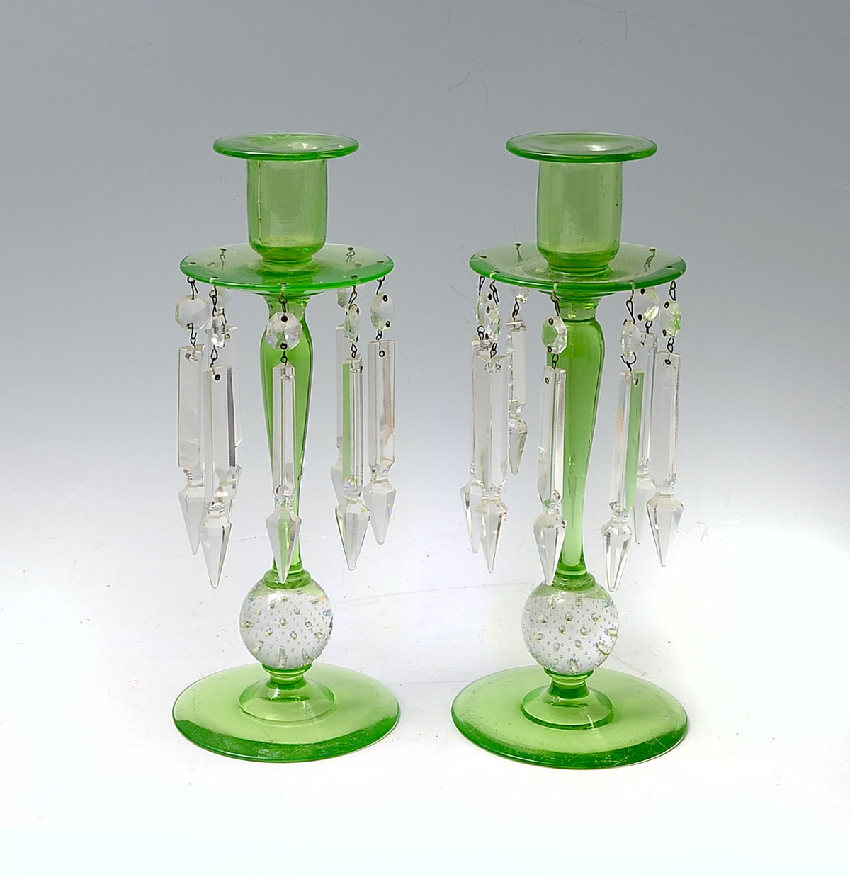 Appraisal: PAIR OF PAIRPOINT VASELINE GLASS CANDLESTICKS - Green uranium glass