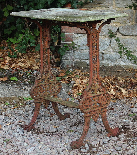 Appraisal: A VICTORIAN CAST IRON CONSERVATORY TABLE with rectangular white marble