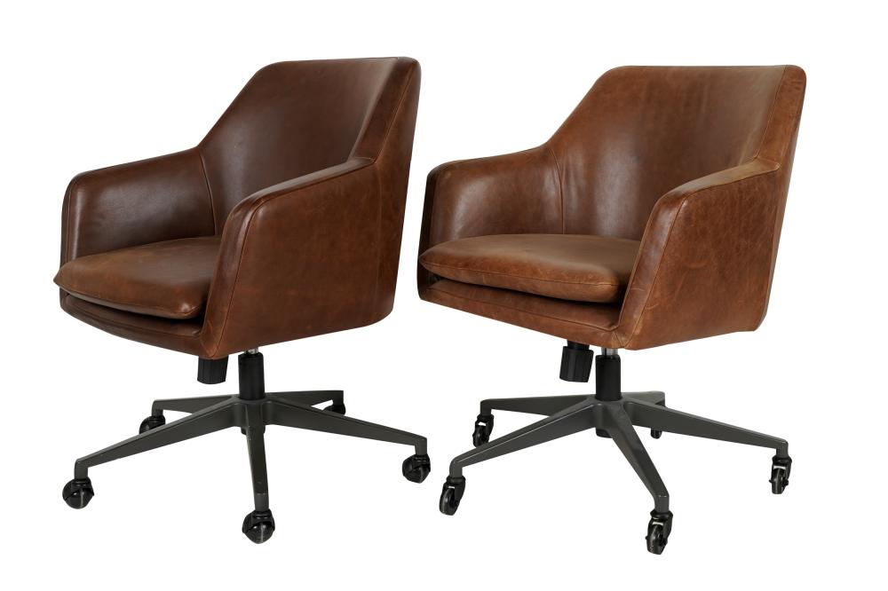 Appraisal: PAIR OF BROWN LEATHER ROLLING CHAIRSwith West Elm labels to