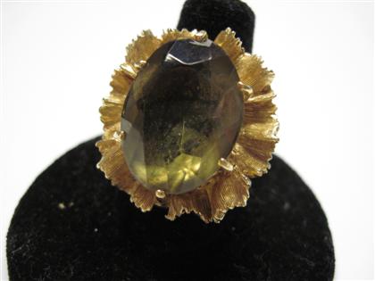 Appraisal: Yellow gold and oval smoky quartz ring th century