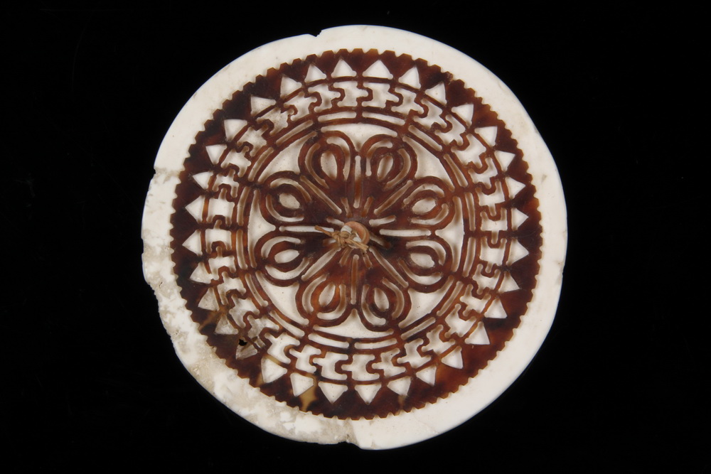 Appraisal: POLYNESIAN SHELL ORNAMENT - Shell Disk overlaid with hand cut