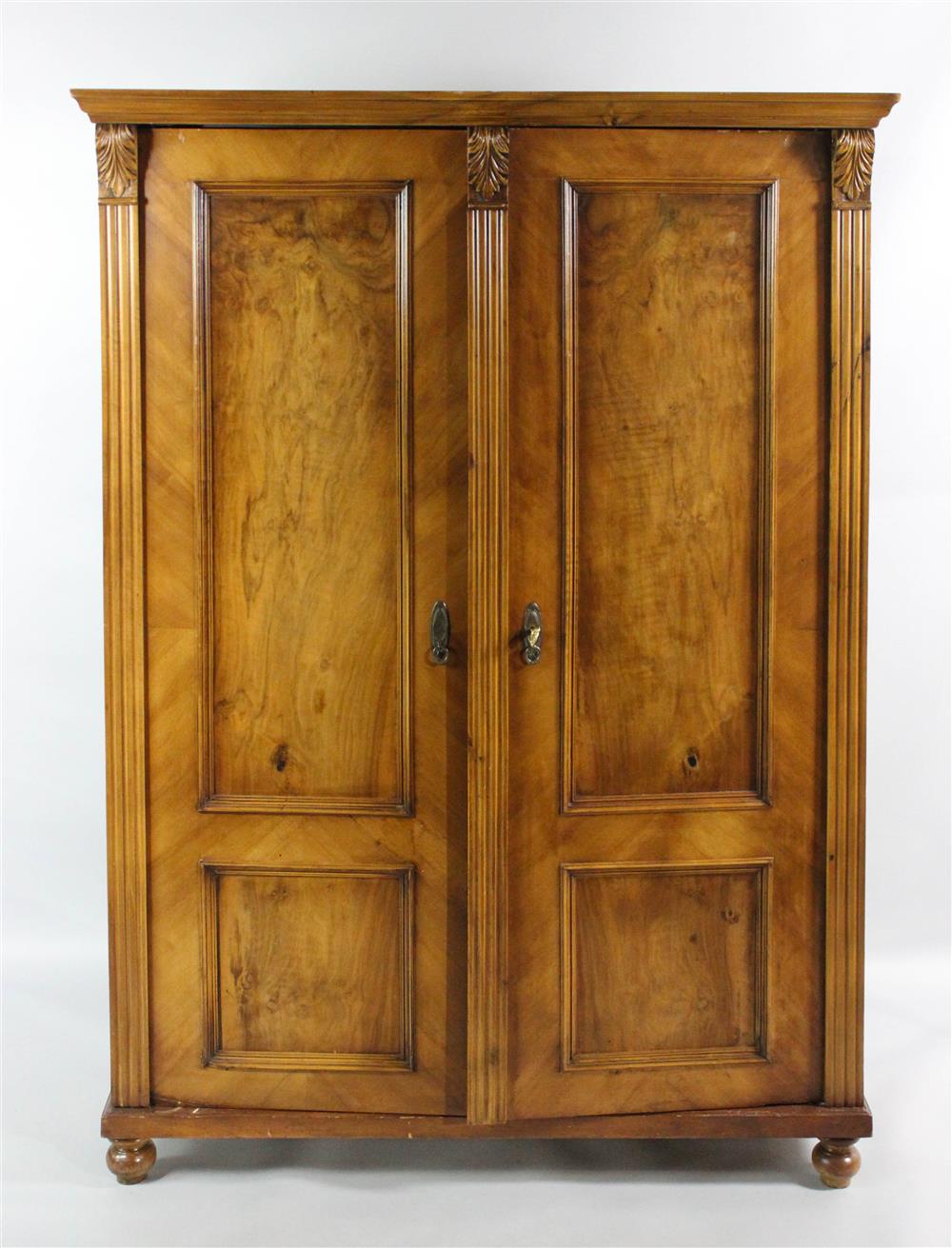 Appraisal: WILLIAM IV STYLE CARVED AND PANELED CHERRYWOOD ARMOIRE having a