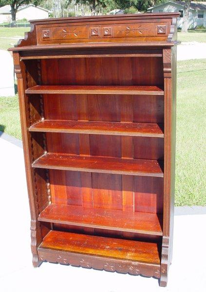 Appraisal: EASTLAKE VICTORIAN OPEN BOOKCASE Incised carvings on the gallery adjustable