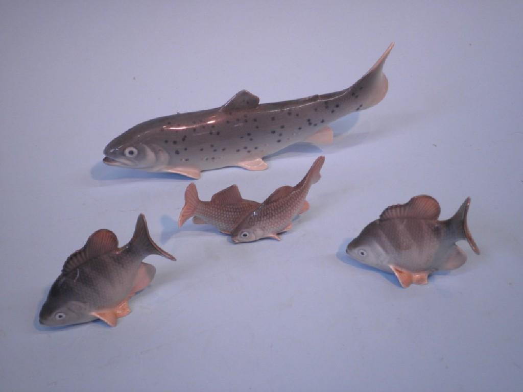 Appraisal: A Royal Copenhagen figure of a salmon two perch and