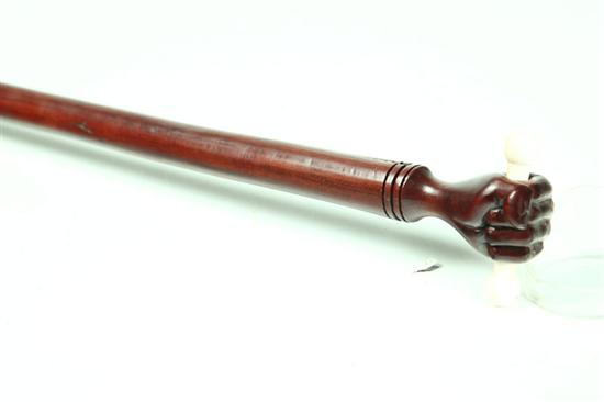 Appraisal: CARVED CANE Probably England late th century mahogany and ivory