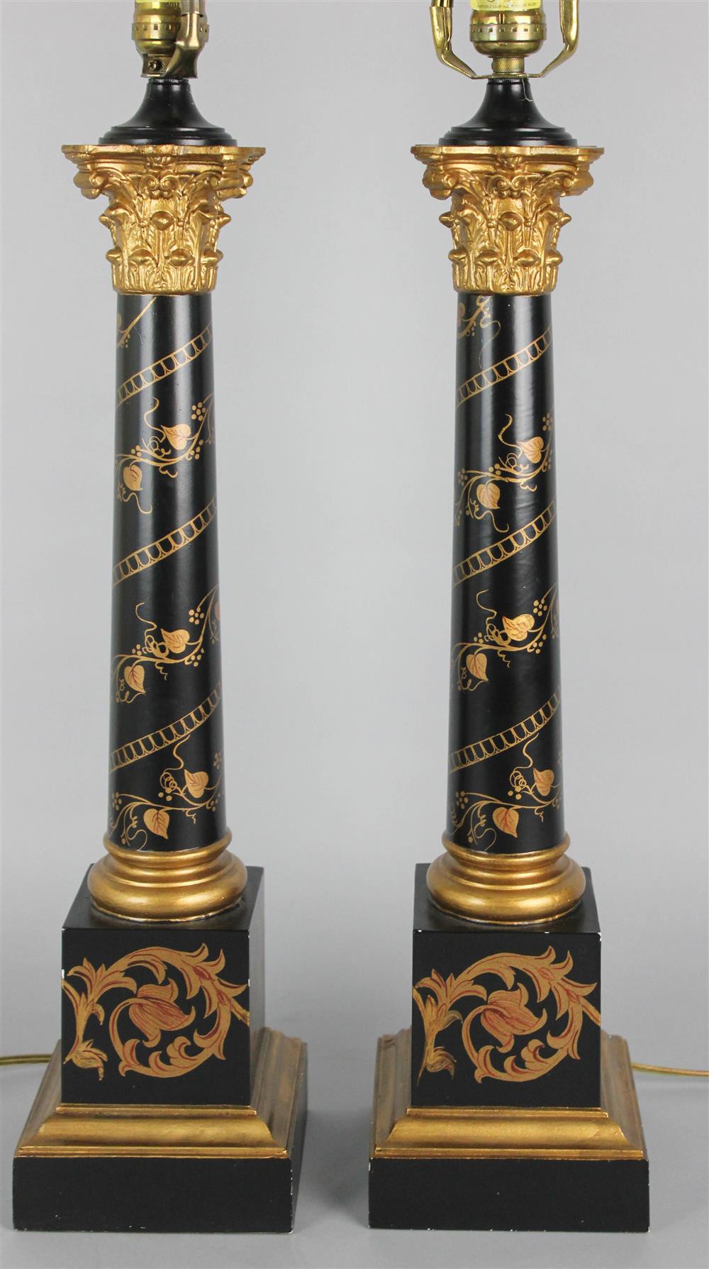 Appraisal: PAIR OF CLASSICAL STYLE BLACK AND GILT COMPOSITION TABLE LAMPS