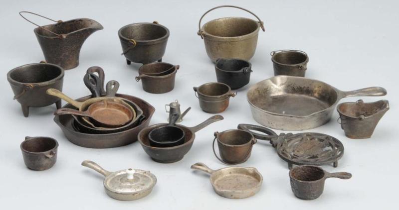 Appraisal: Lot of Cast Iron Children's Stove Accessories Description Includes pots