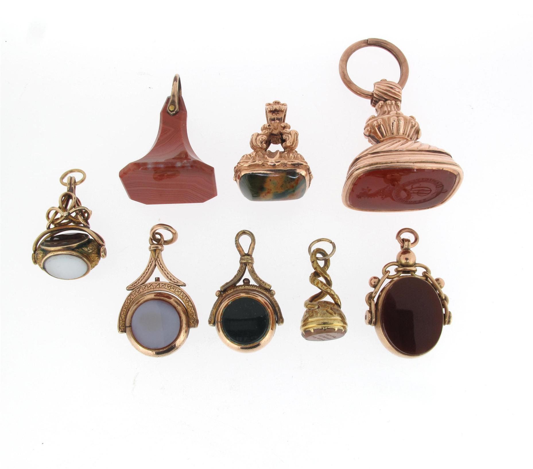 Appraisal: Four assorted stone set fob seals and four assorted spinning