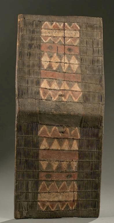 Appraisal: DRC polychrome wicker shield th century An arched rectangular shaped