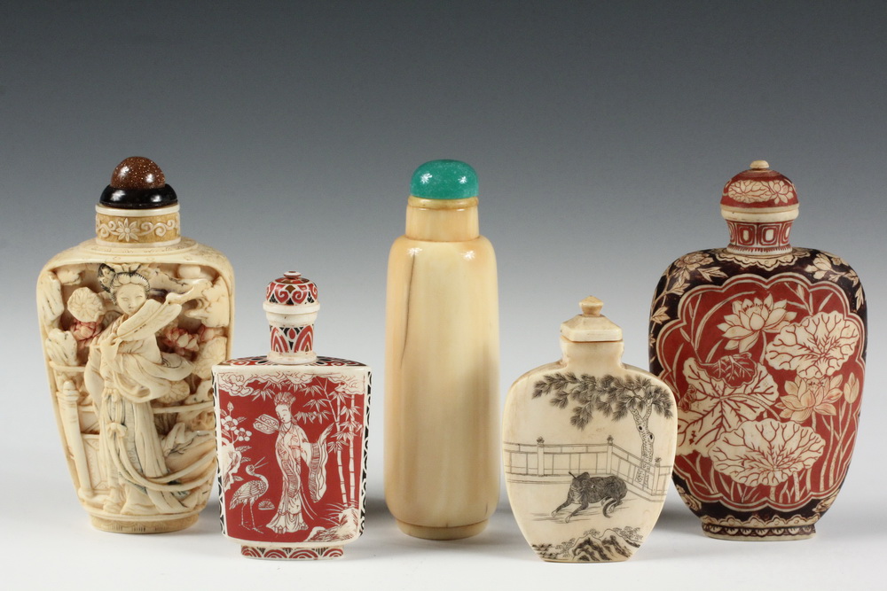 Appraisal: A GROUP OF IVORY SNUFF BOTTLES - Including A Large