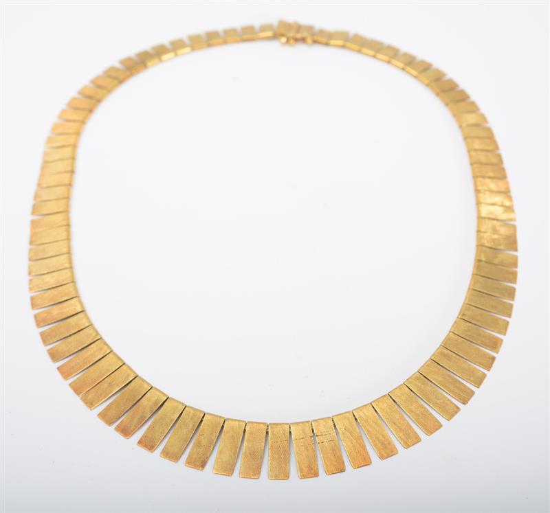 Appraisal: K GOLD NECKLACE Designed as a panel fringe necklace stamped