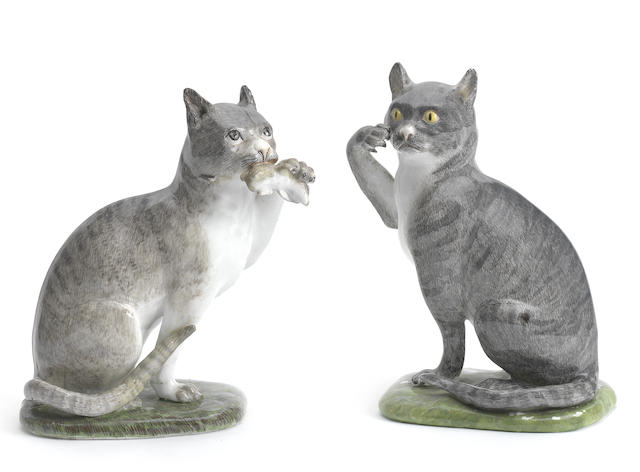 Appraisal: A pair of Meissen models of cats circa Modelled by