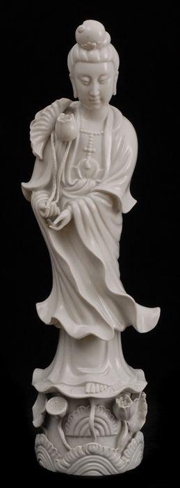 Appraisal: BLANC DE CHINE PORCELAIN FIGURE OF KWAN YIN Modeled in