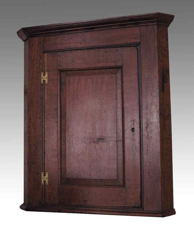 Appraisal: EARLY ENGLISH OAK WALL MOUNT HANGING CORNER CABINET Single paneled