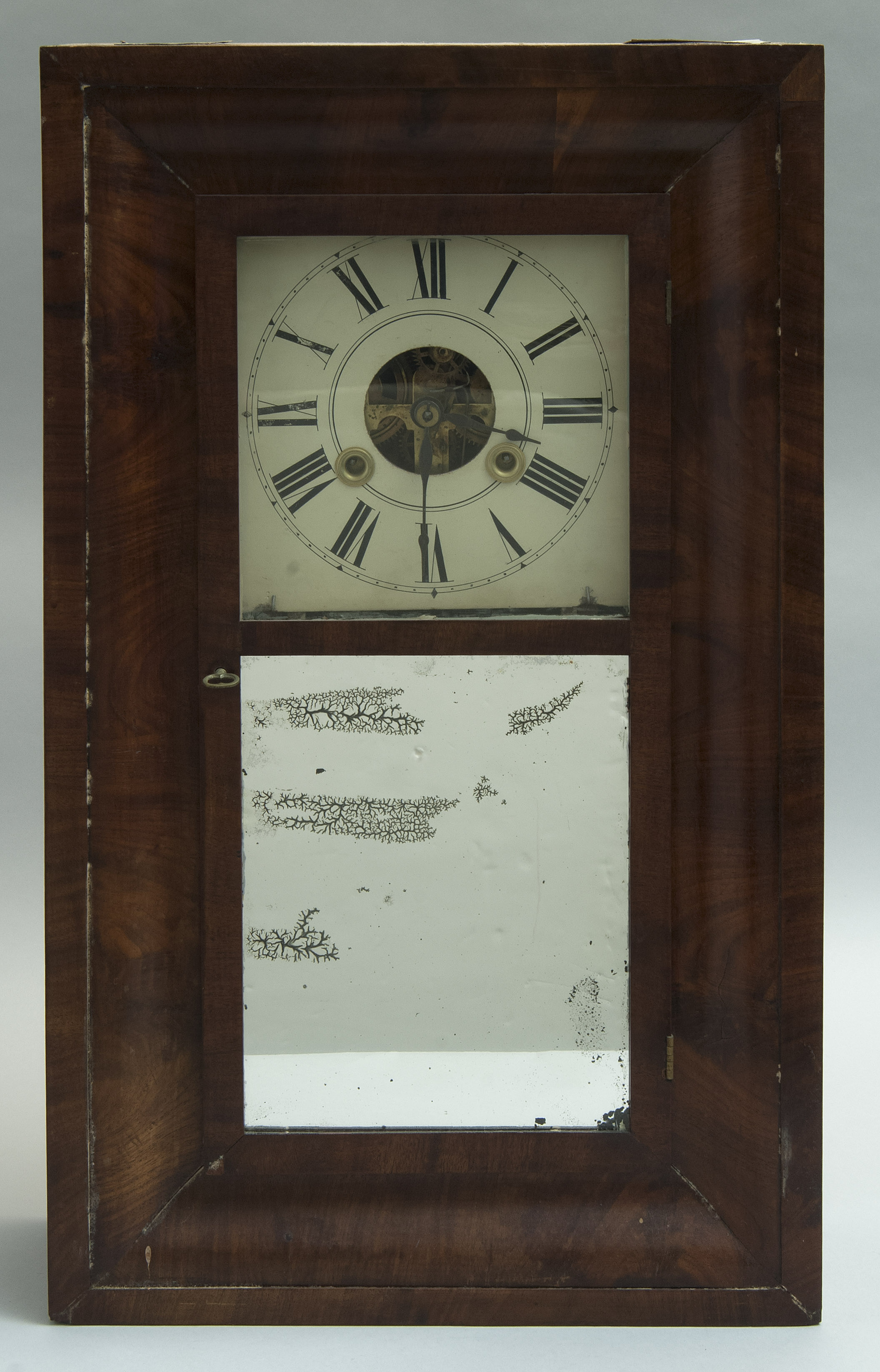 Appraisal: EMPIRE OGEE CASED SHELF CLOCK Circa Maker unknown Mahogany veneer