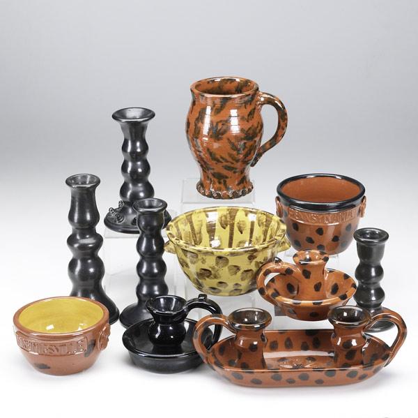 Appraisal: Eleven James Seagraves redware pieces th C Three chambersticks three