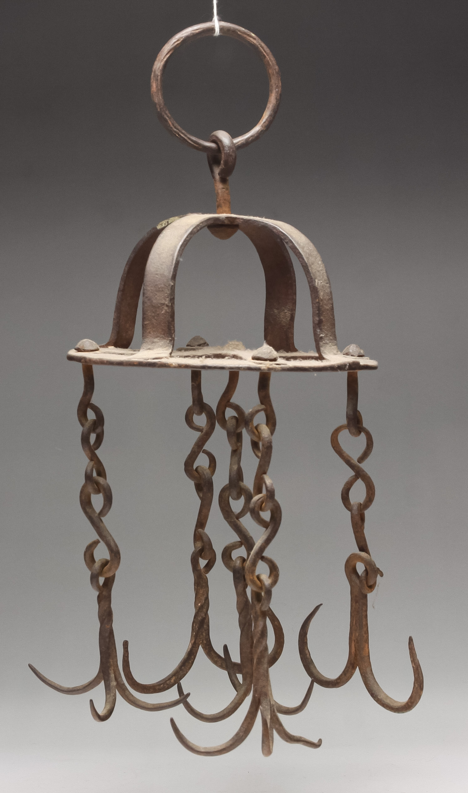 Appraisal: AMERICAN HANGING CROWN RACK Nineteenth century wrought iron Small size