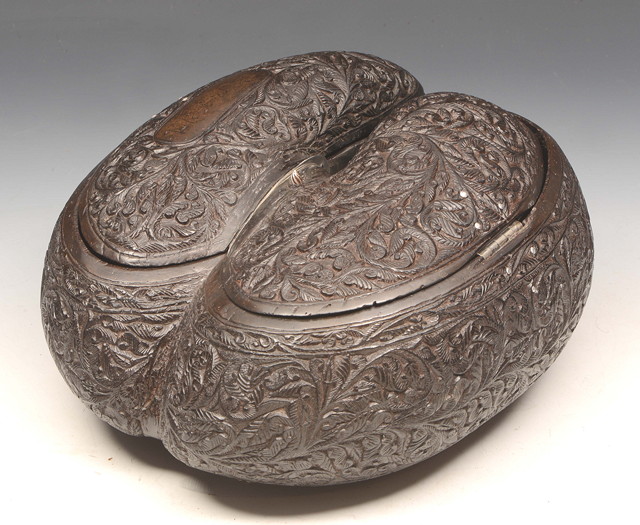 Appraisal: AN INDO-PORTUGUESE COCO DE MER BOX with hinged rising lid