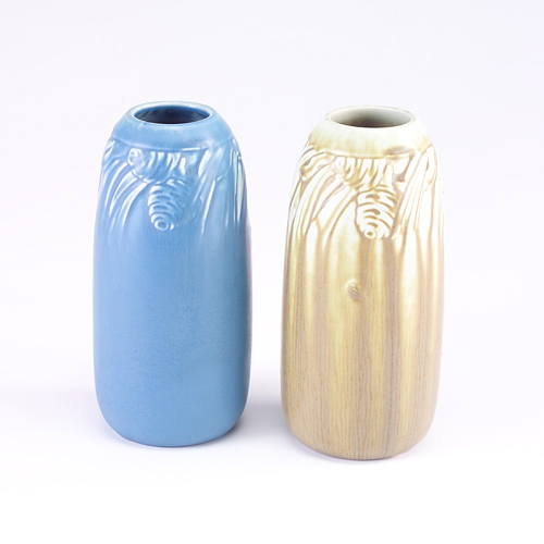 Appraisal: ROOKWOOD Two Production ovoid vases embossed with pine cones and