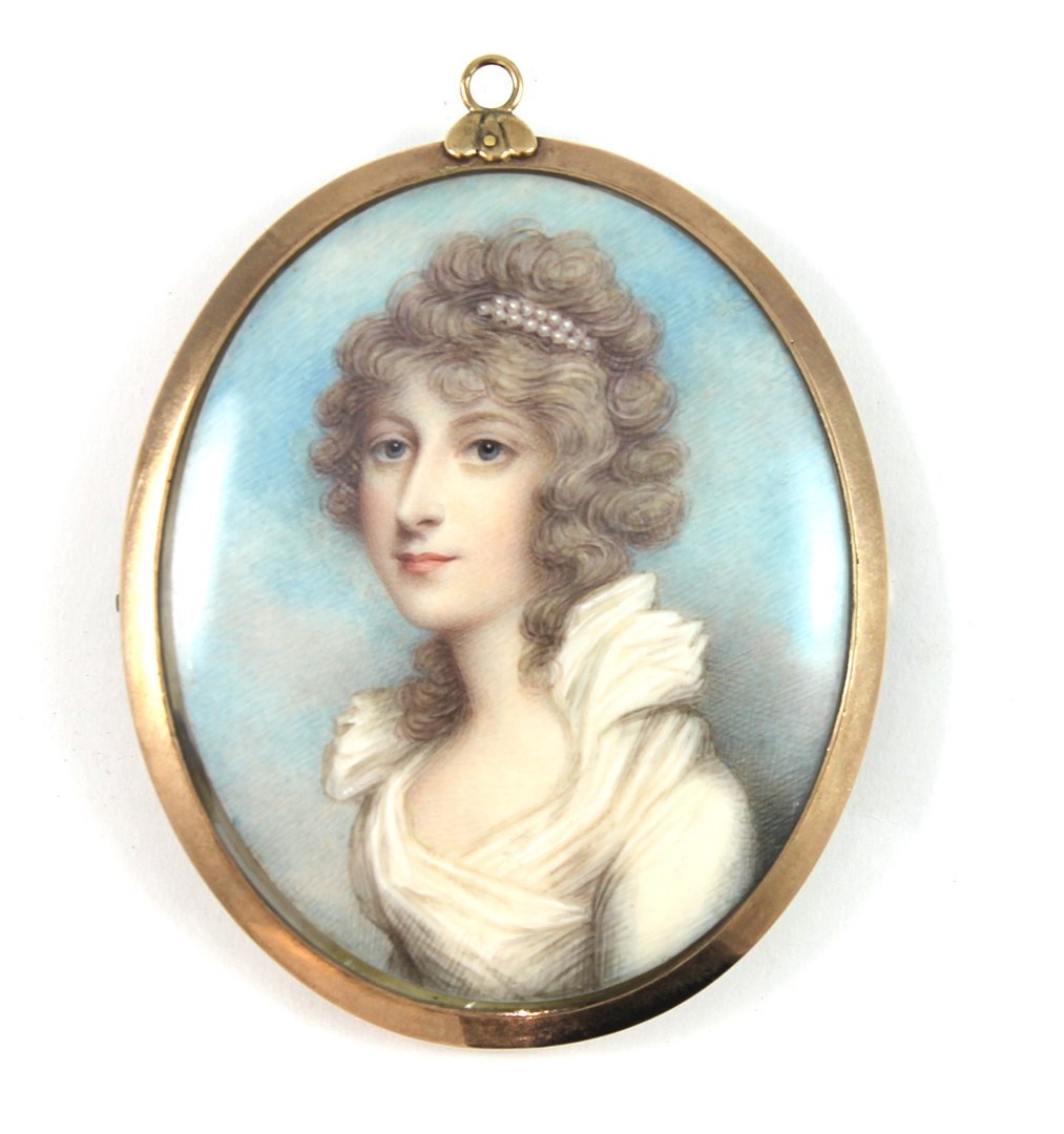 Appraisal: An oval portrait miniature of a lady with curly light