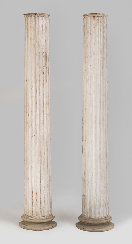 Appraisal: PAIR OF WHITE-PAINTED FLUTED HALF-ROUND PILASTERS With Doric capitals x