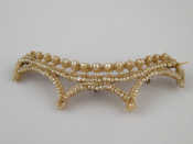 Appraisal: A seed pearl brooch with gold pin probably converted from