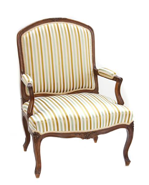 Appraisal: A George III style silk-upholstered mahogany armchair height in width