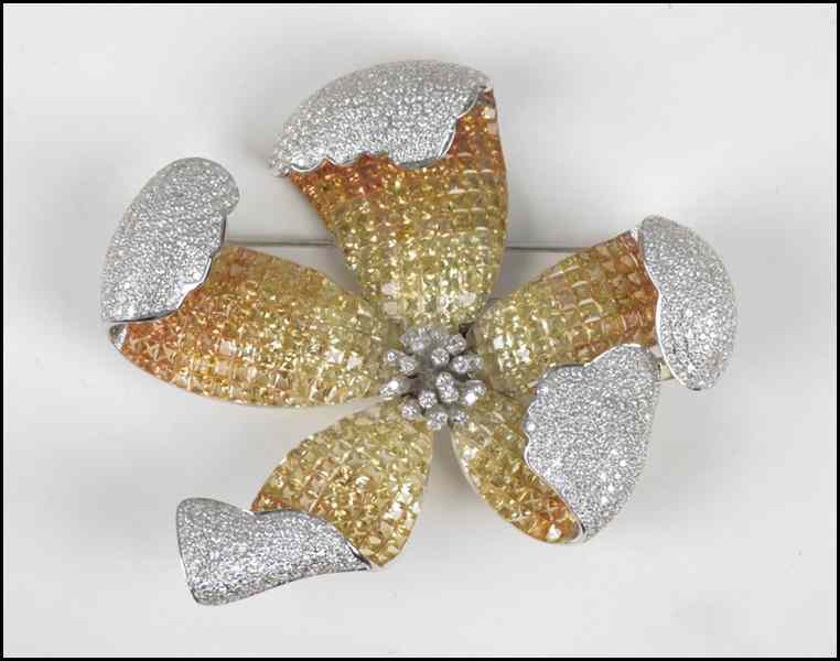 Appraisal: DIAMOND SAPPHIRE AND KARAT WHITE GOLD FLOWER CLIP BROOCH Pave