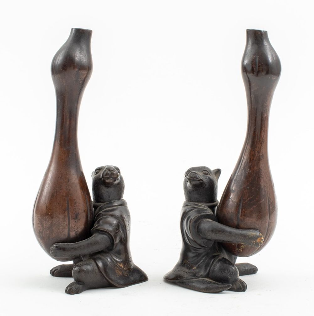 Appraisal: JAPANESE MEIJI STYLE BRONZE ANIMAL BUD VASES PAIR Japanese Meiji