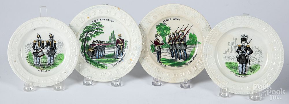 Appraisal: Four Staffordshire ABC plates Four Staffordshire ABC plates with military