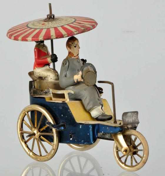 Appraisal: Tin Litho Lehmann Onkel-Onkel Wind-Up Toy German Working Original umbrella