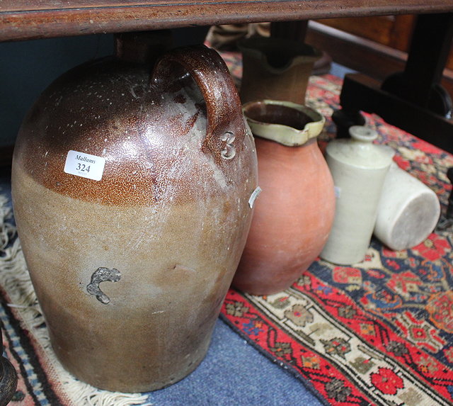 Appraisal: AN ANTIQUE STONEWARE FLAGON cm in height together with two