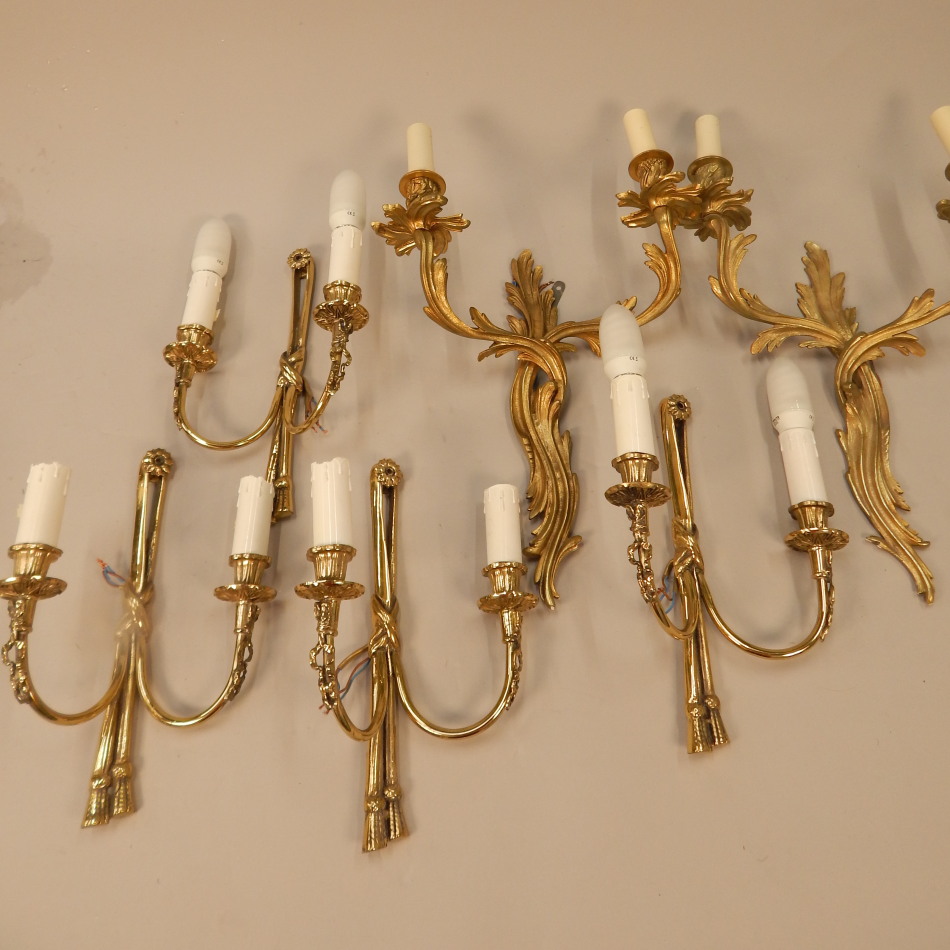 Appraisal: Various wall lights to include a pair of gilt brass