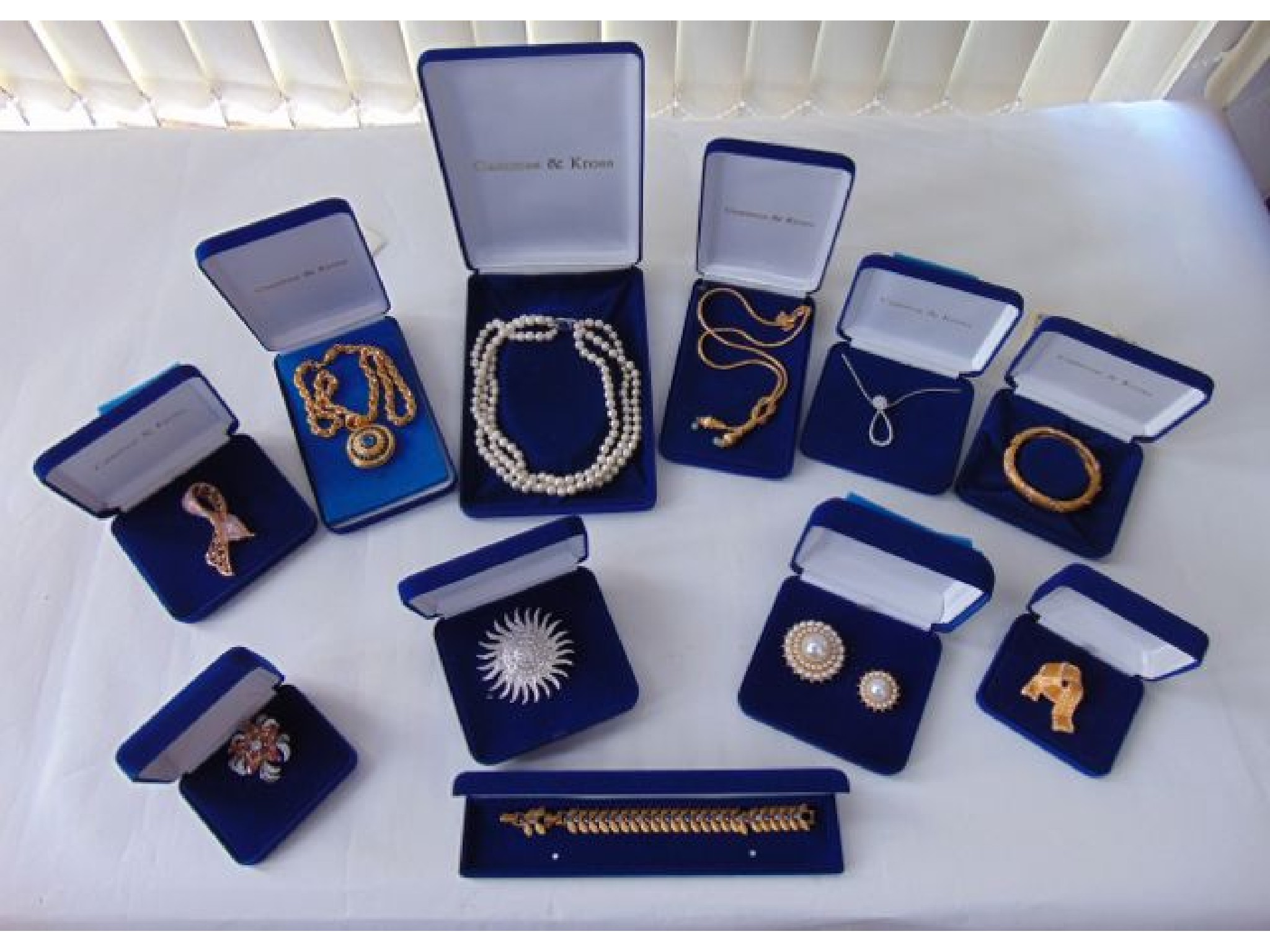 Appraisal: A collection of Camrose Kross Jacqueline Kennedy costume jewellery including