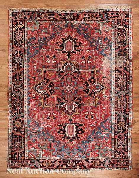 Appraisal: A Semi-Antique Heriz Carpet red and blue central field ground