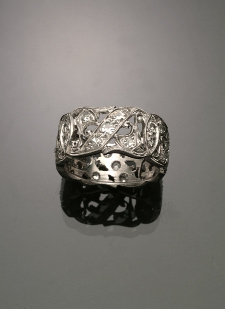 Appraisal: Art Deco Platinum and Diamond Eternity Band Circa The reticulated