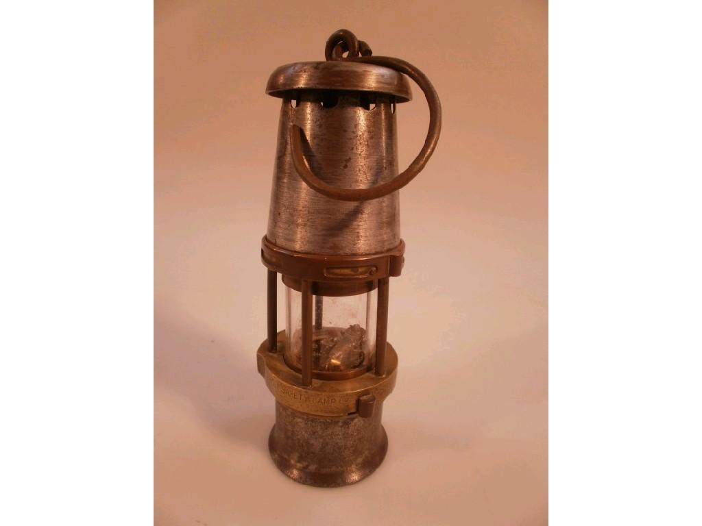 Appraisal: A baby Wolf Miners Lamp by the Wolf Safety Lamp