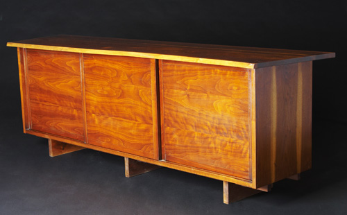 Appraisal: GEORGE NAKASHIMA Fine walnut buffet with free-edge front to overhanging