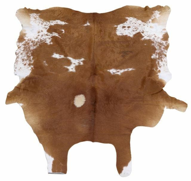 Appraisal: Cowhide white reddish brown largest measurements approx x