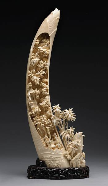 Appraisal: A carved ivory tusk th Century In the form of